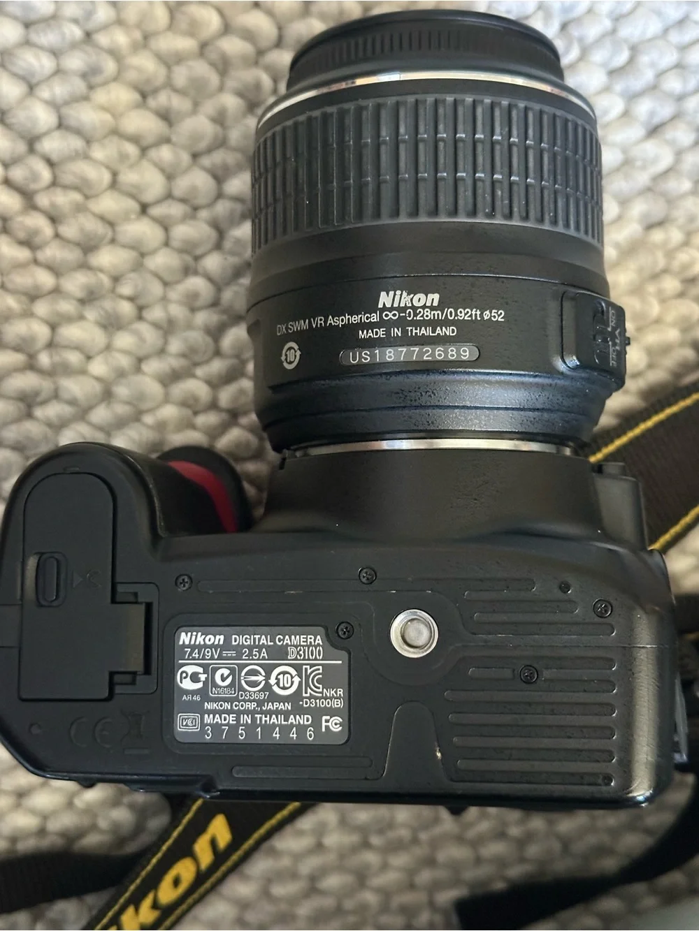 Nikon Black DSLR Camera with Black Lens and Strap